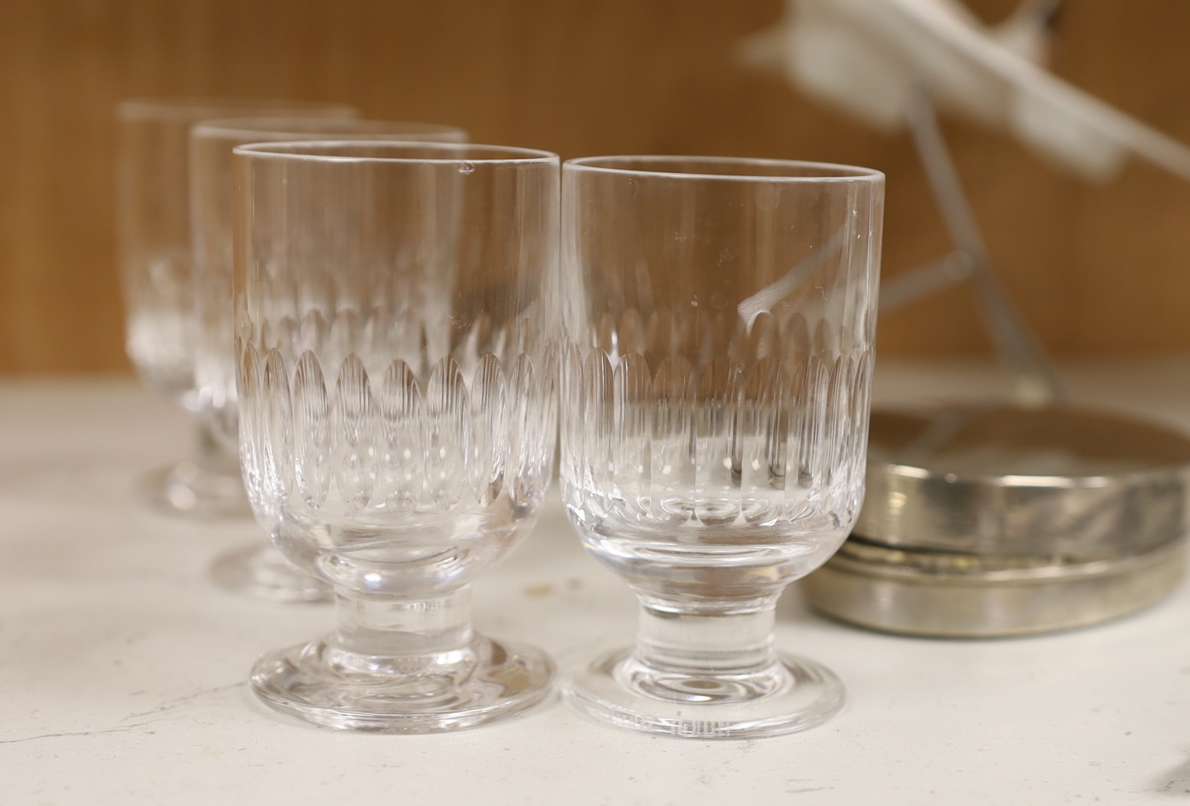 Concorde memorabilia comprising four British Airways glass tots, a pair of plated cased clothes brushes, three graduated scale models of Concorde and a bottle opener together with four Wedgwood Royal Air Force Club mugs